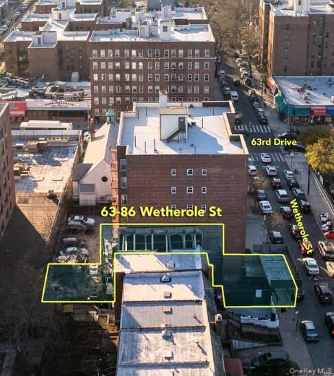 Property Photo:  63-86 Wetherole Street  NY 11374 