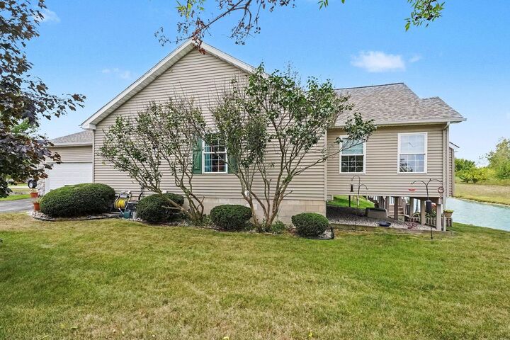 Property Photo:  512 Hampton Lake  MI 48732 