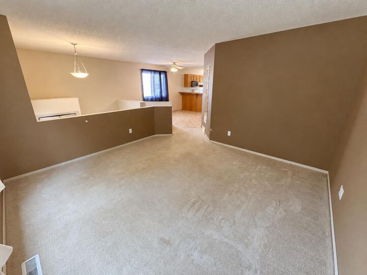 Property Photo: 263 Heritage Court W AB T1K 7W2