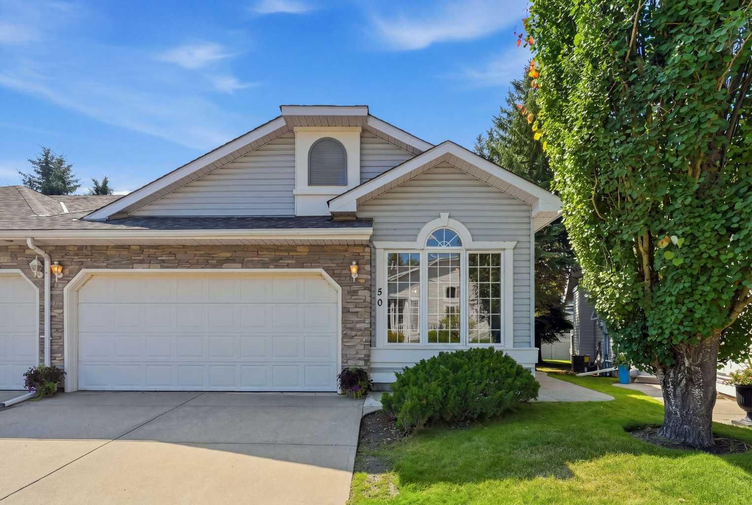 Property Photo:  50 Douglasview Park SE  AB T2G 5T2 