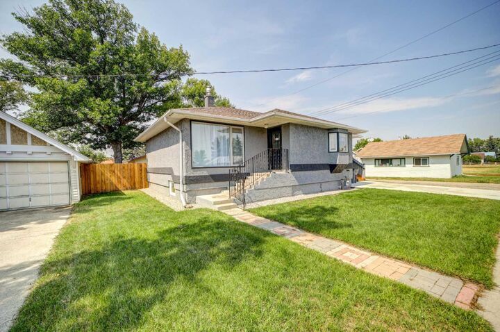 Property Photo:  5113 2 Street W  AB T0L 0T0 