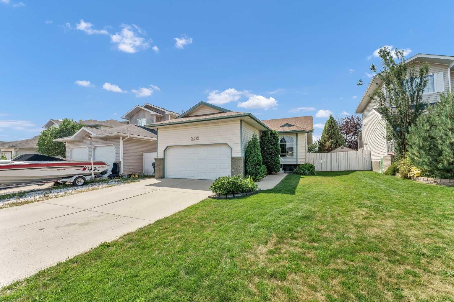 Property Photo: 402 Stratton Way SE AB T1B 4N2