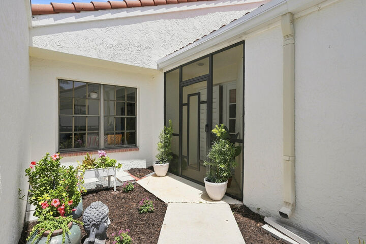 Property Photo: 11190 Stonybrook Lane FL 33437