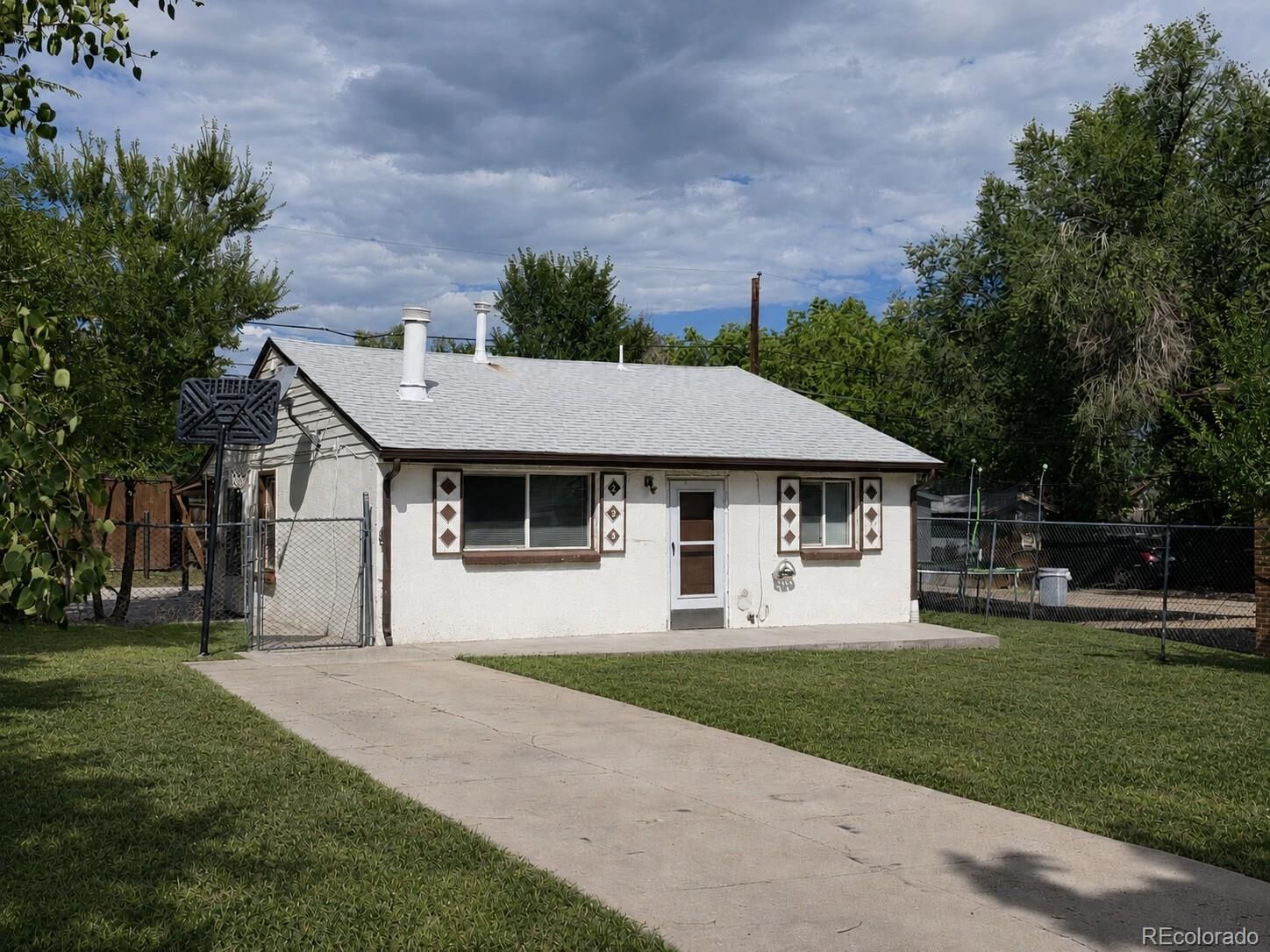 Property Photo:  235 S Meade Street  CO 80219 