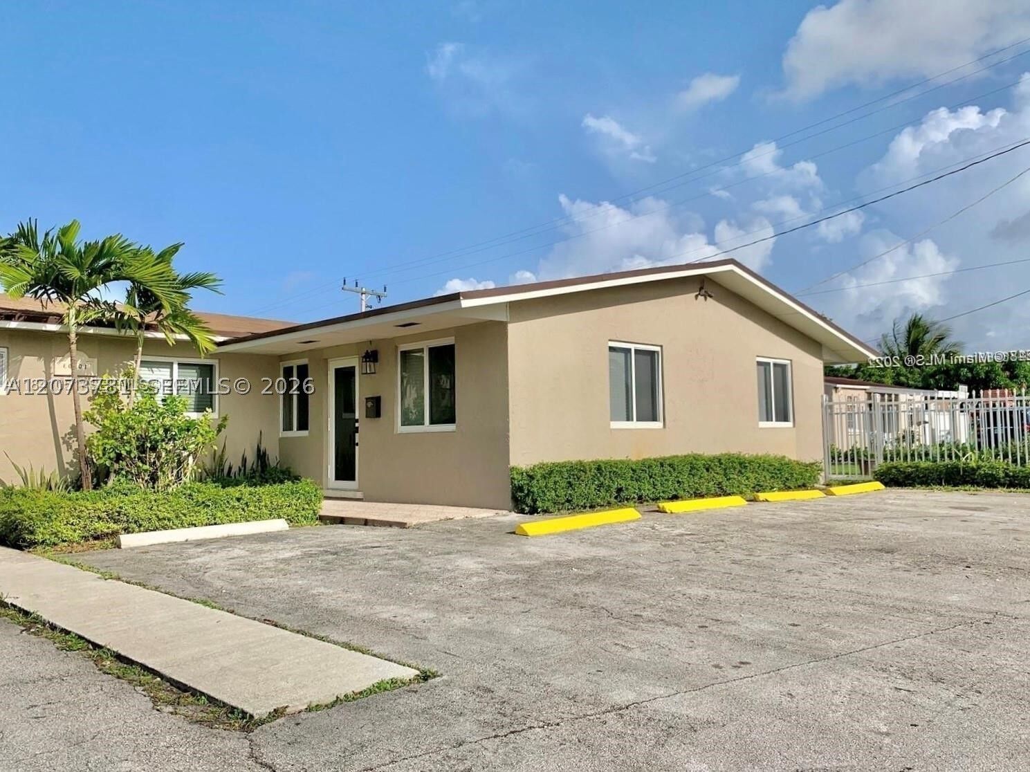Property Photo:  10300 NW 35th Ct  FL 33147 