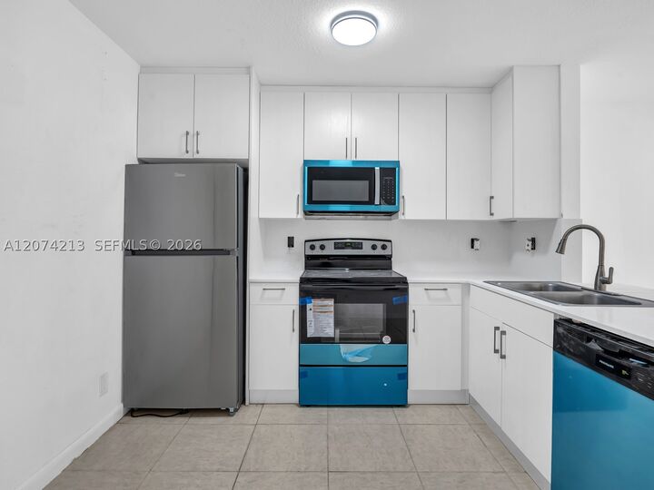 Property Photo:  241 NW 40th St 3  FL 33309 