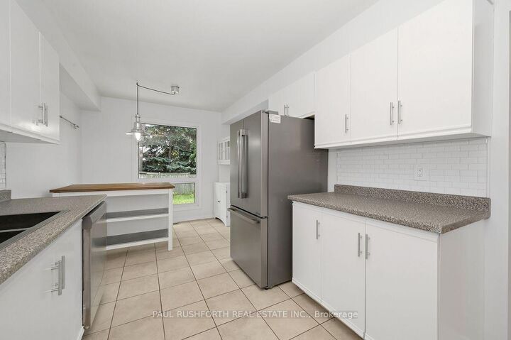 Property Photo:  244 Huntersfield Drive  ON K1T 3M5 