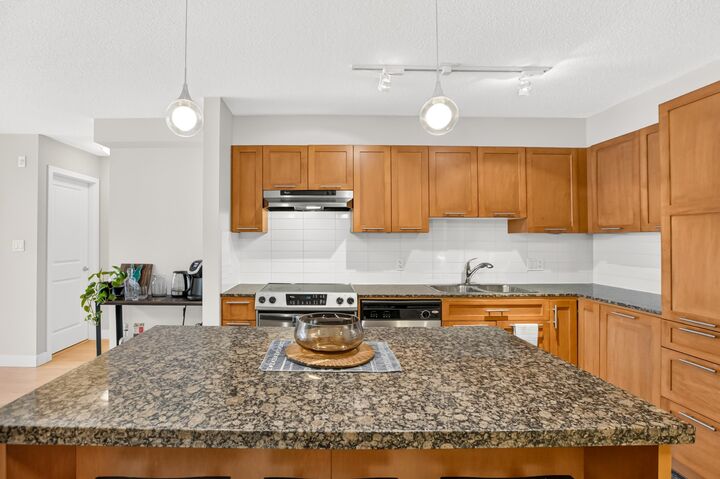 Property Photo: 19673 Meadow Gardens Way 234 BC V3Y 0A1