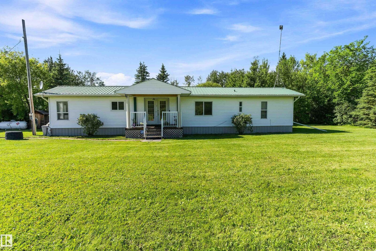 Property Photo: 254054 Twp Road 460 AB T9A 1W8