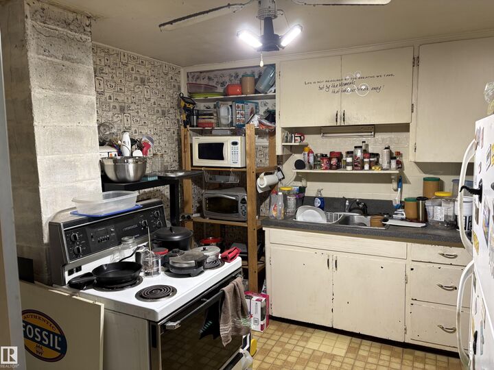 Property Photo: 12044 64 Street NW AB T5W 4J6