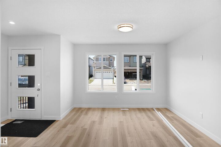 Property Photo:  20847 16 Avenue NW  AB T6M 1L2 