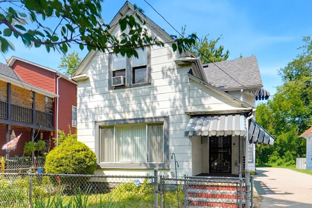 Property Photo:  7311 Montgomery Avenue  OH 44104 