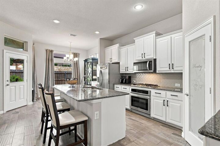 Property Photo: 3908 Ranchman Boulevard TX 76210
