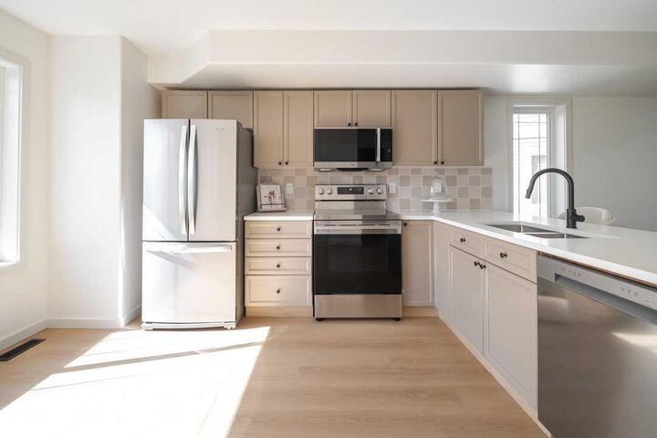 Property Photo: 240 Laffont Way 53 AB T9K 2W2