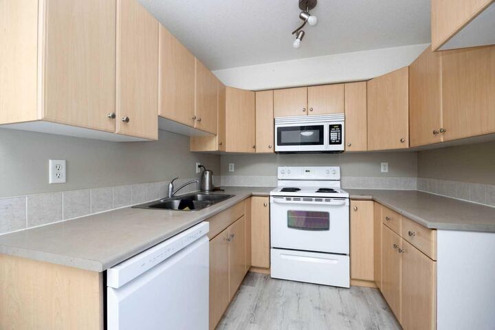 Property Photo: 200 Lougheed Drive 2302 AB T9K 2W3