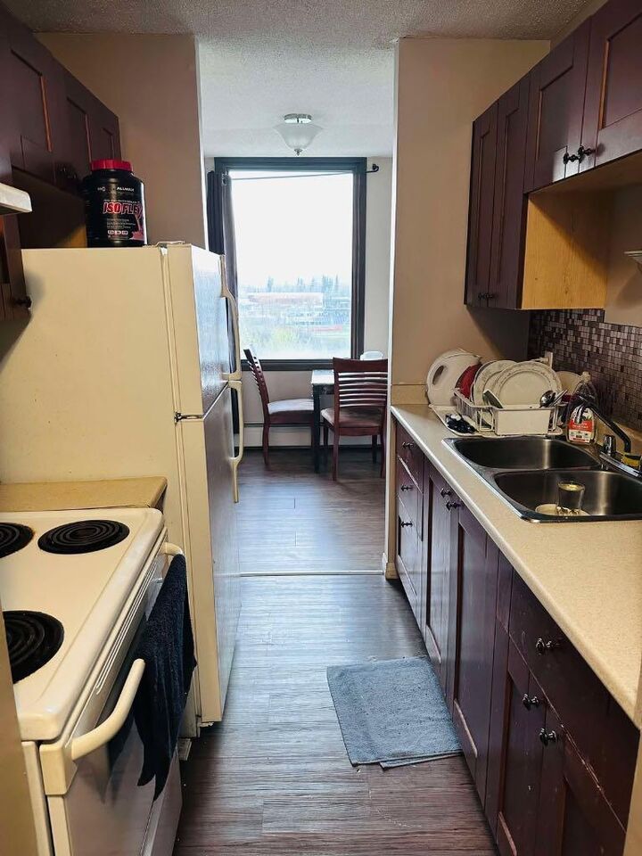 Property Photo: 13221 Macdonald Drive 811 AB T9H 4H1