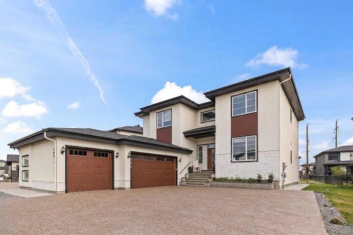 Property Photo: 308 Grange Lane AB T1Z 0B8