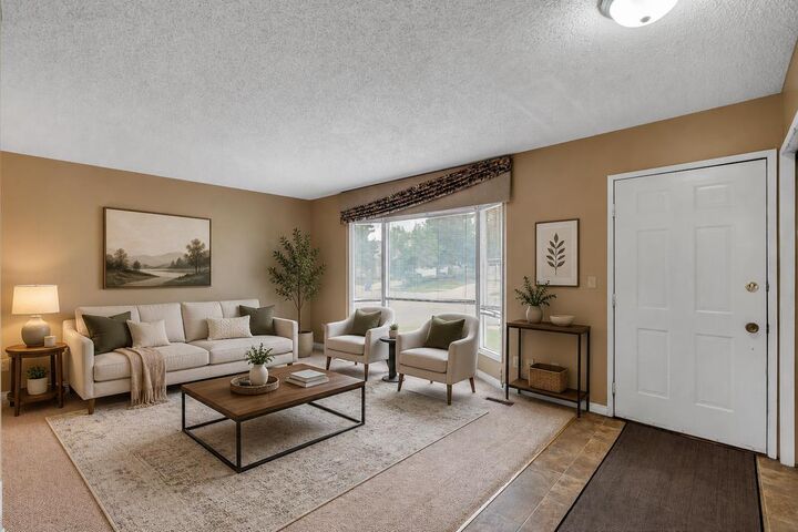 Property Photo: 703 Woodpark Boulevard SW AB T2W 3M9
