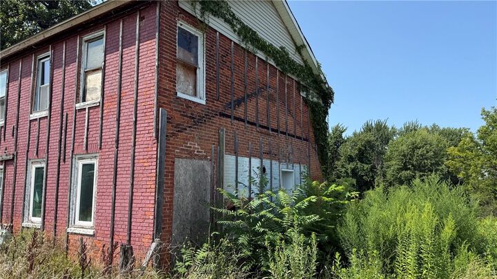 Property Photo:  14909 Ridge Road W  NY 14477 
