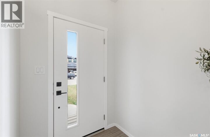 Property Photo:  446 Aniskotaw Way  SK S7V 1M3 