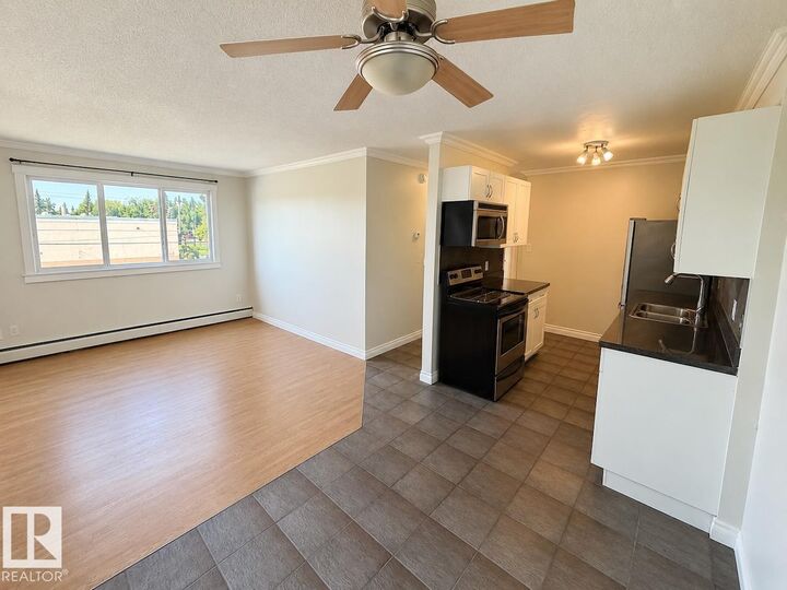 Property Photo:  10904 159 Street NW 9  AB T5P 3C1 