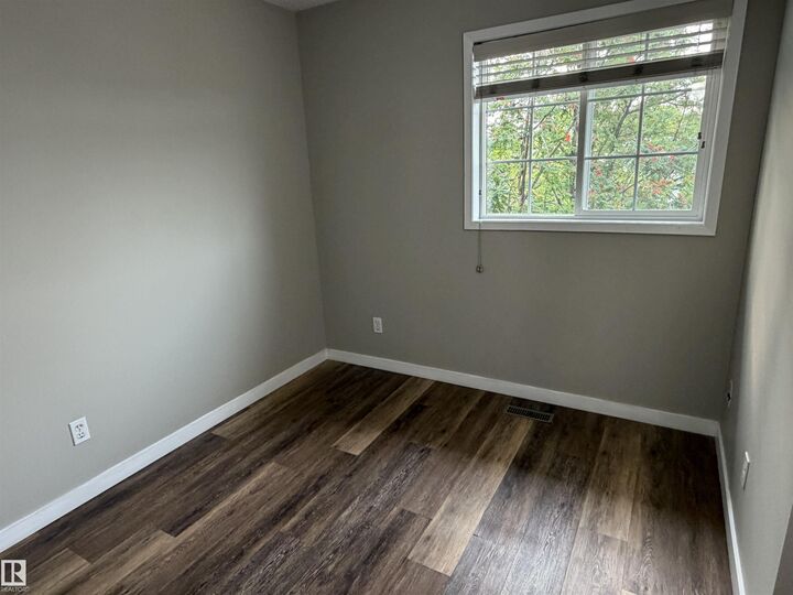 Property Photo:  1535 80A Street NW  AB T6K 4E2 