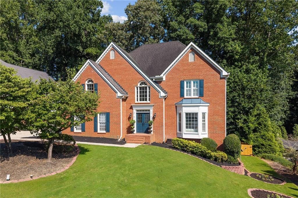Property Photo:  10245 Groomsbridge Road  GA 30022 