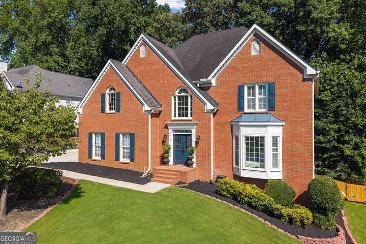 Property Photo:  10245 Groomsbridge Road  GA 30022 