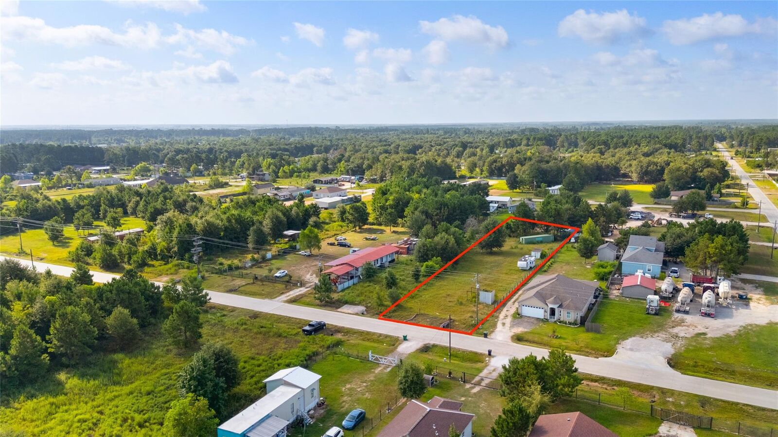 Property Photo: 1200 County Road 5017 TX 77327