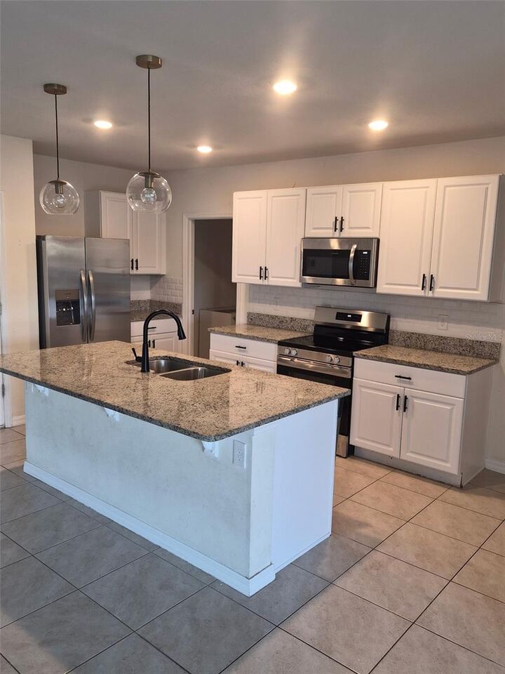 Property Photo:  225 Caryota Court  FL 32168 