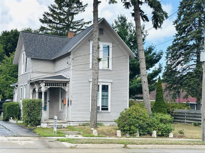 Property Photo:  510 Cypress Street  MI 49660-1968 
