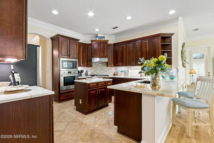 Property Photo:  97012 Laffites Way  FL 32097 