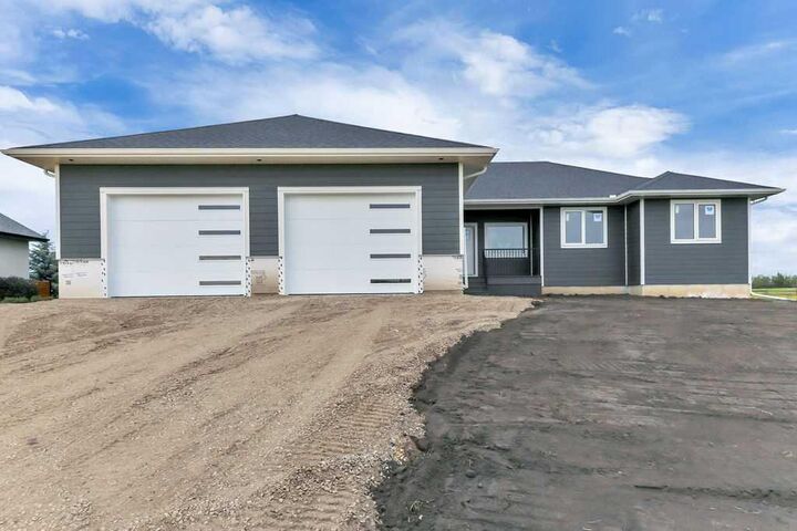 Property Photo: 513 Dunes Ridge Drive AB T4J 1R2