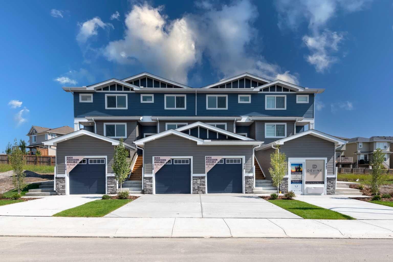 Property Photo: 174 Heritage Circle AB T4C 3M9