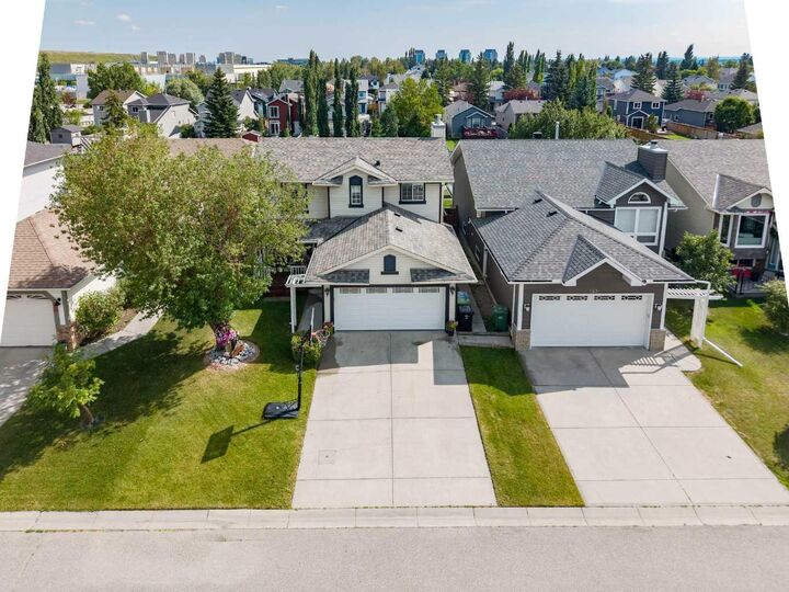 Property Photo: 144 Riverstone Crescent SE AB T2C 4A3