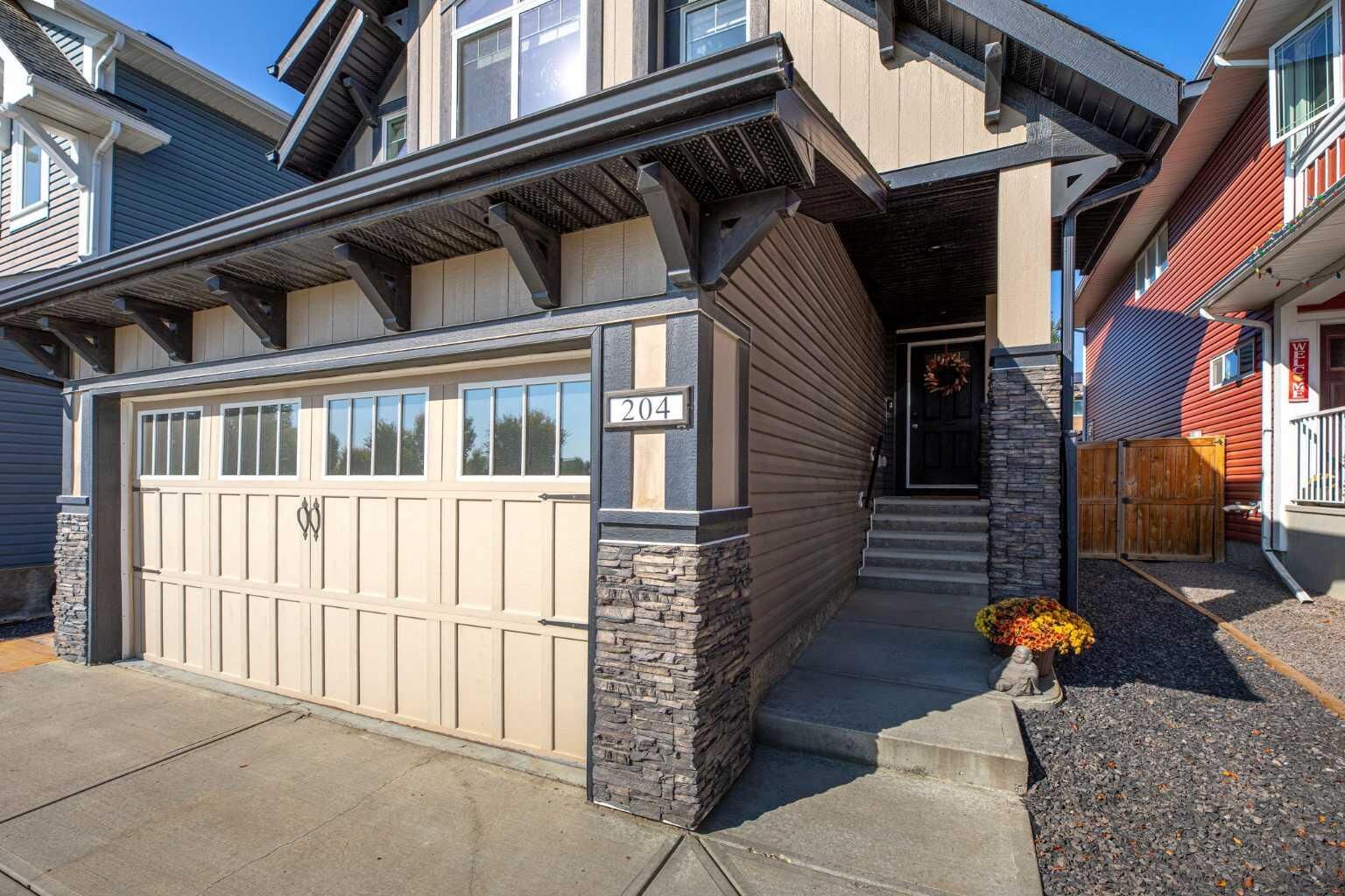 Property Photo: 204 Paint Horse Drive AB T4C 0X1