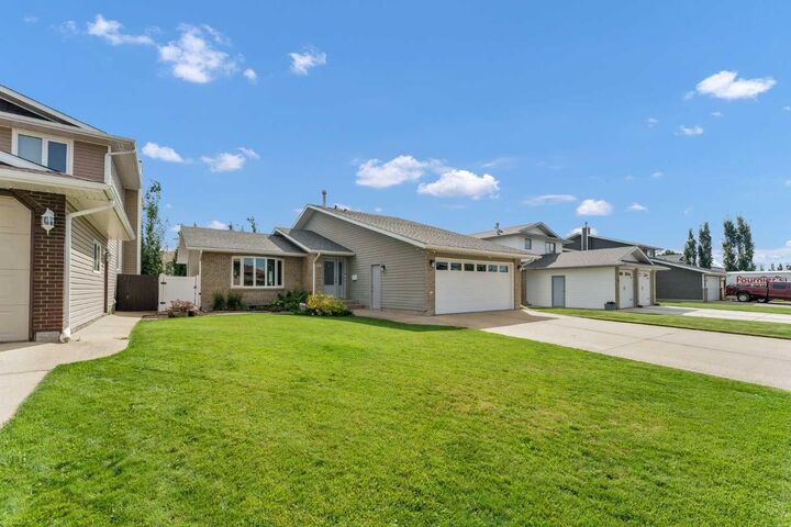 Property Photo: 29 Rice Drive SE AB T1B 3X2