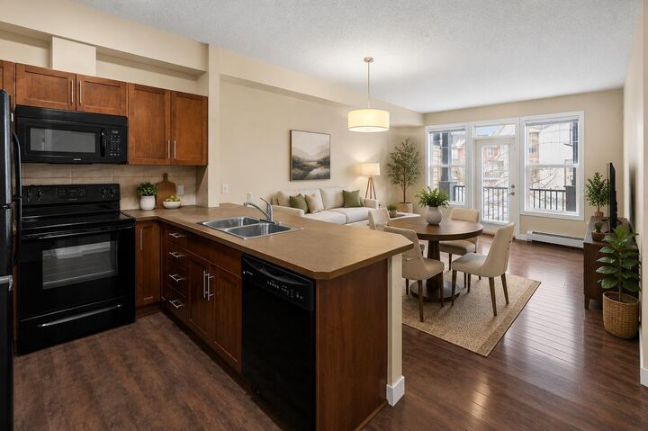 Property Photo:  10 Panatella Road NW 212  AB T3K 0V4 