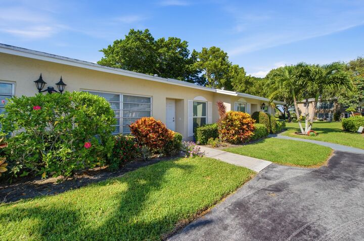 Property Photo:  13782 Vía Flora #C  FL 33484 