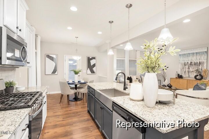 Property Photo:  1216 Madingley Place 62  NC 27591 