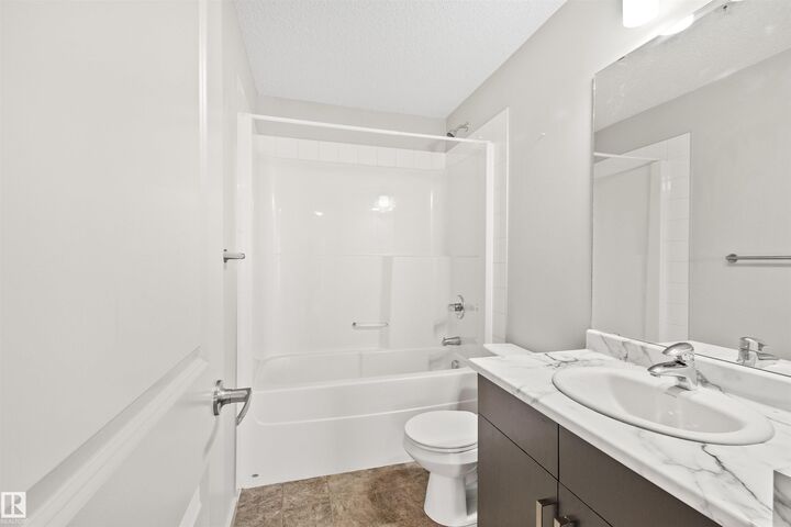 Property Photo: 5521 7 Avenue SW 318 AB T6X 2A8