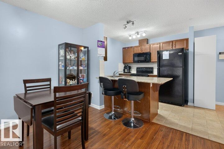 Property Photo: 271 Charlotte Way 102 AB T8H 0N9