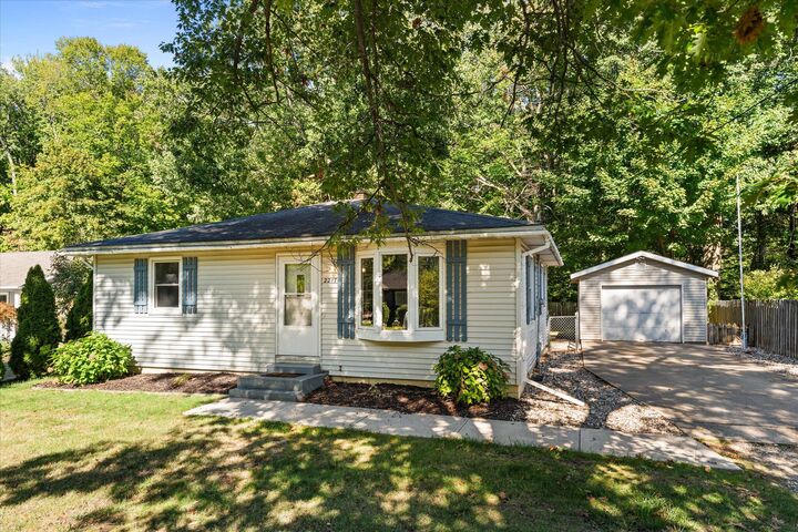 Property Photo:  2217 W Lakewood Boulevard  MI 49424 