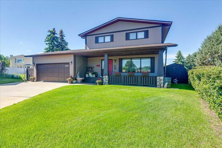 Property Photo:  5323 Margodt Close  AB T4G 1E6 
