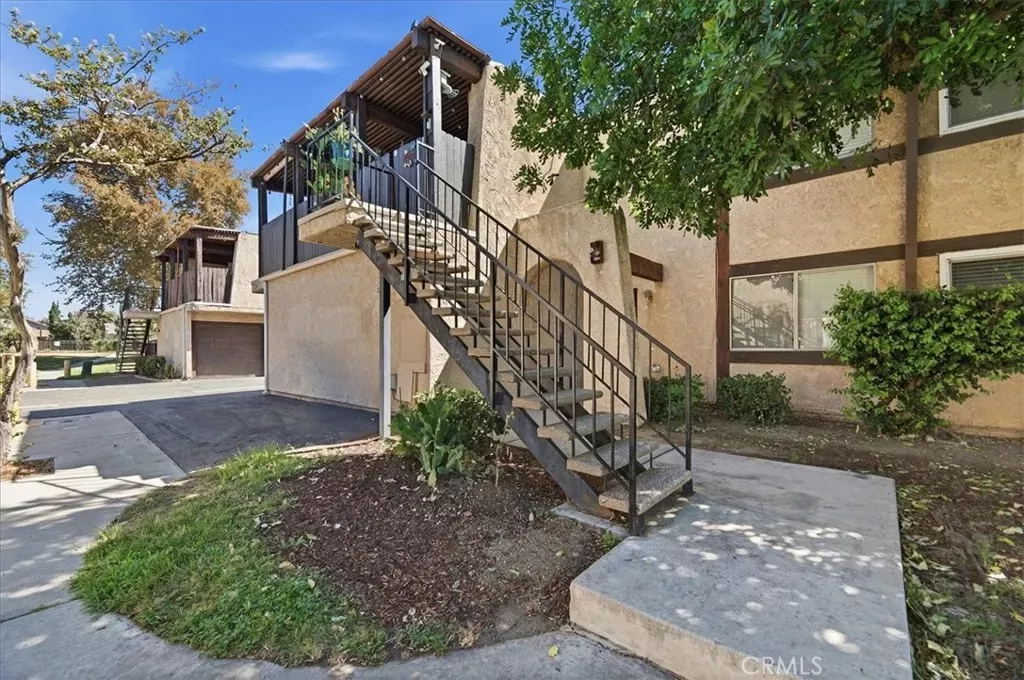 Property Photo:  12241 Carnation D  CA 92557 