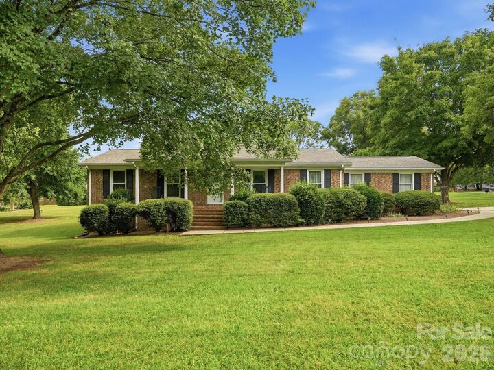 Property Photo:  1807 NW Alamance Drive 103  NC 28027 
