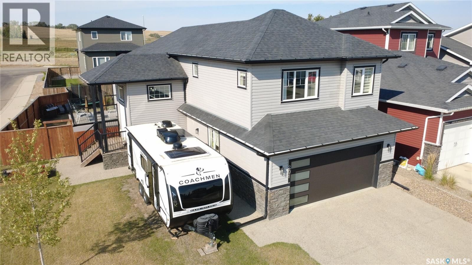 Property Photo: 201 Valley Meadow Court SK S9H 5N2