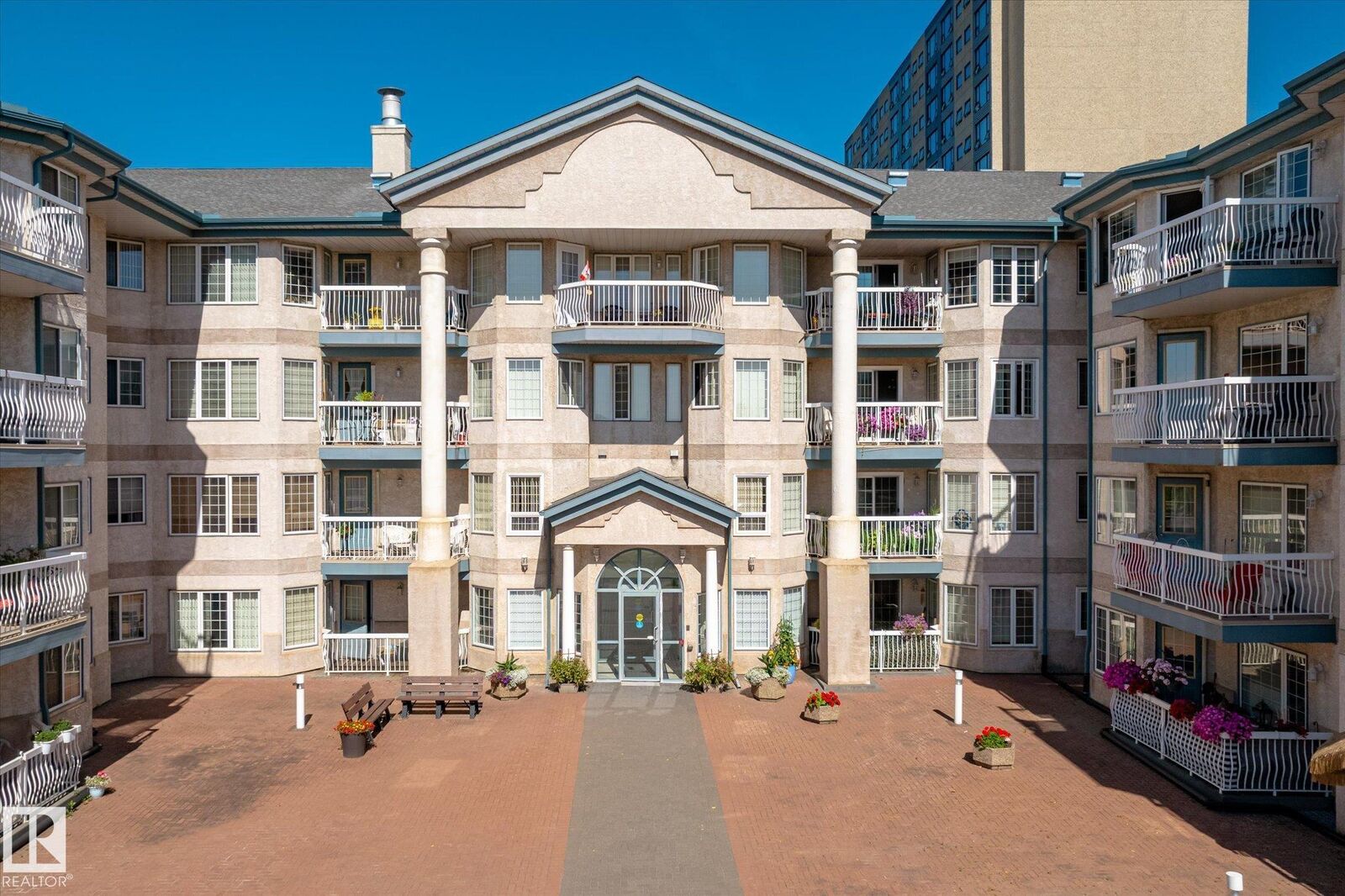 Property Photo:  13450 114 Avenue NW 309  AB T5M 4C4 