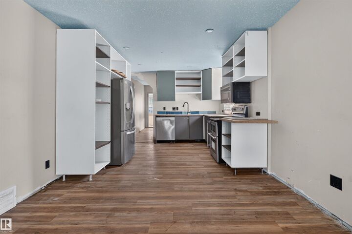 Property Photo:  11327 89 Street NW  AB T5B 3T5 