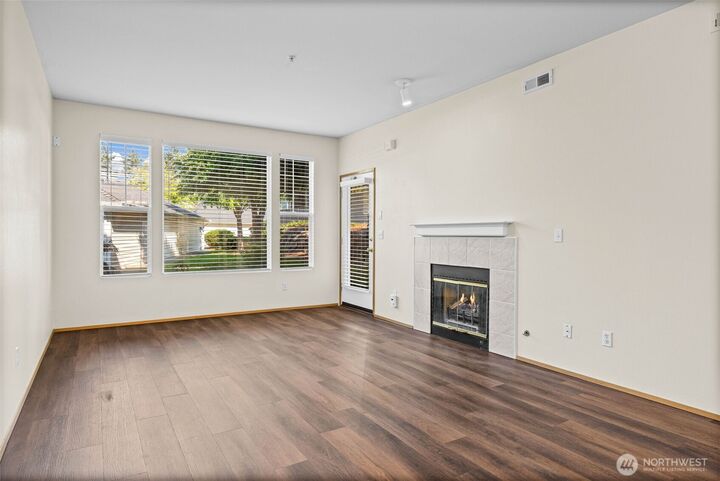 Property Photo:  4714  Mill Pond Drive SE 403  WA 98092 